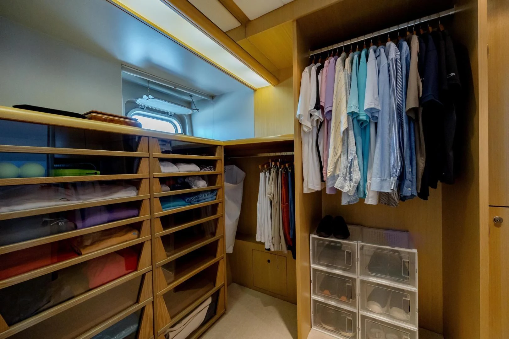 a closet full of clothes aboard DREAM RIDER Yacht for Sale
