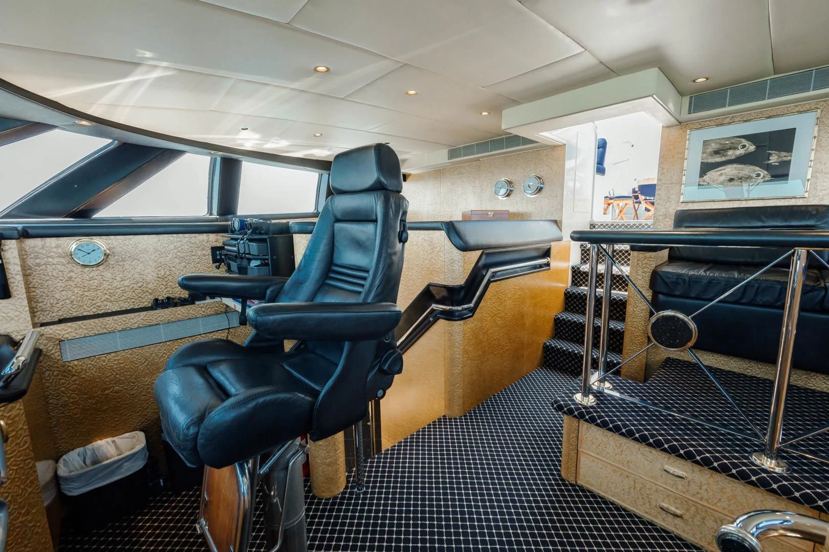 a room with a large bed and a table aboard DREAM RIDER Yacht for Sale