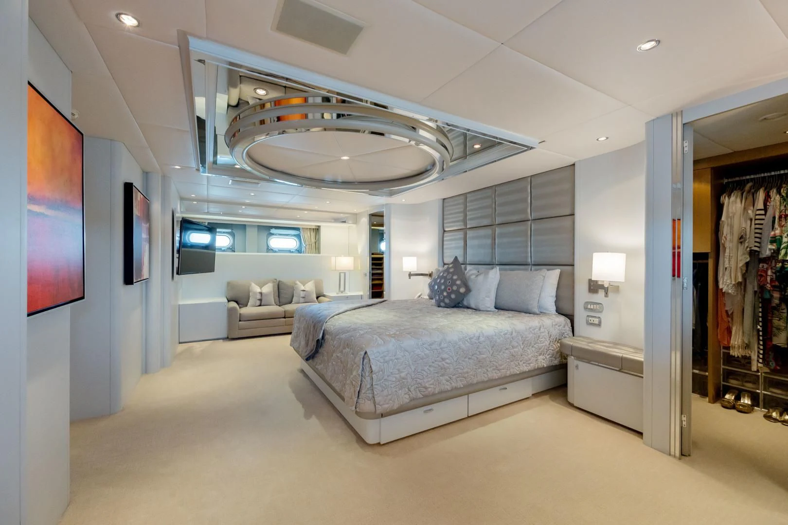 a large room with a couch and a fan aboard DREAM RIDER Yacht for Sale