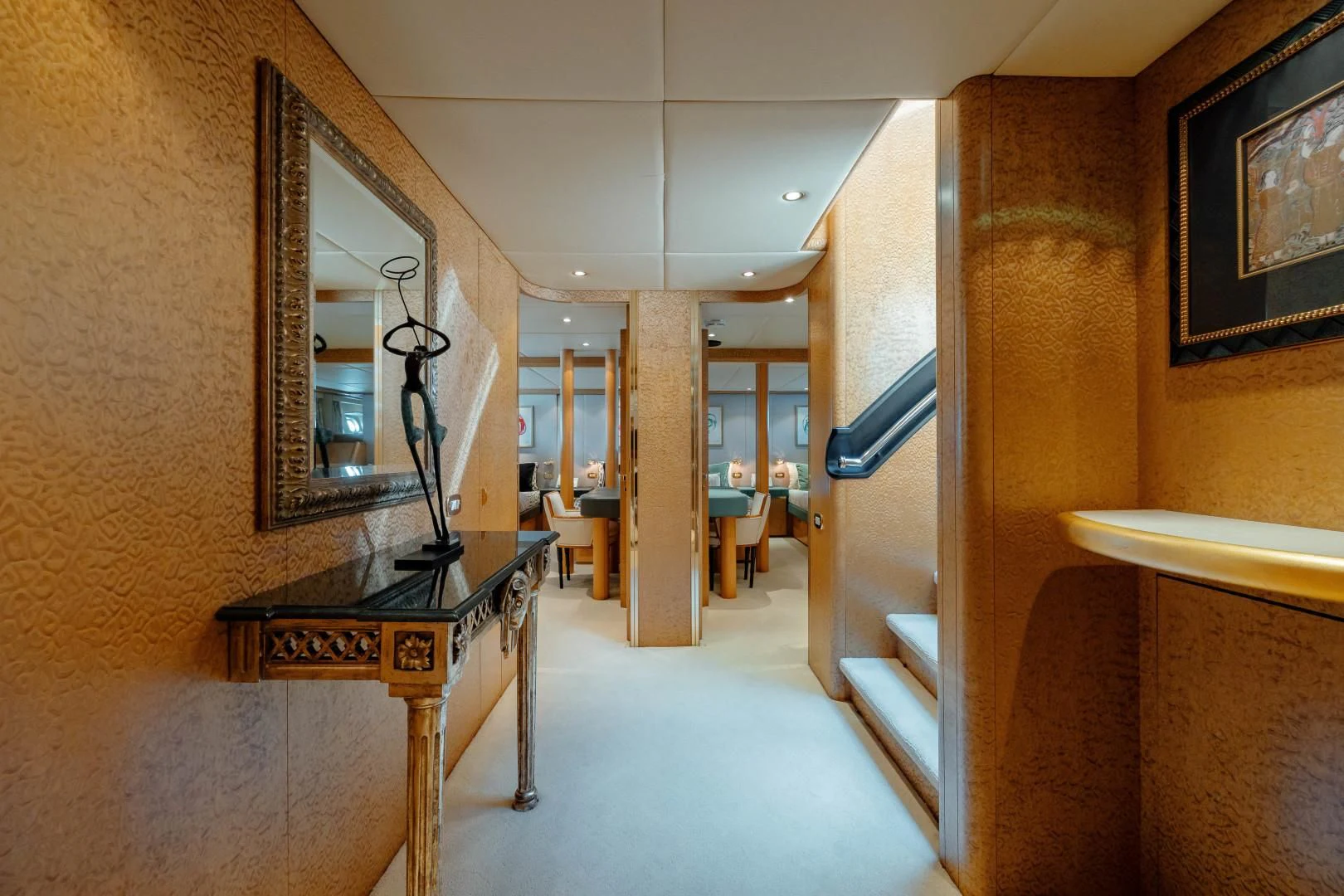 a room with a table and chairs aboard DREAM RIDER Yacht for Sale