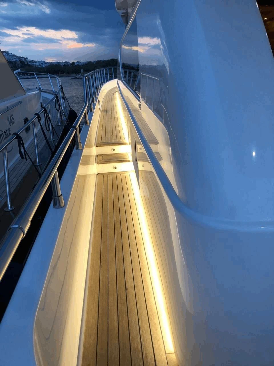 a long dock with a railing aboard LEGEND Yacht for Sale