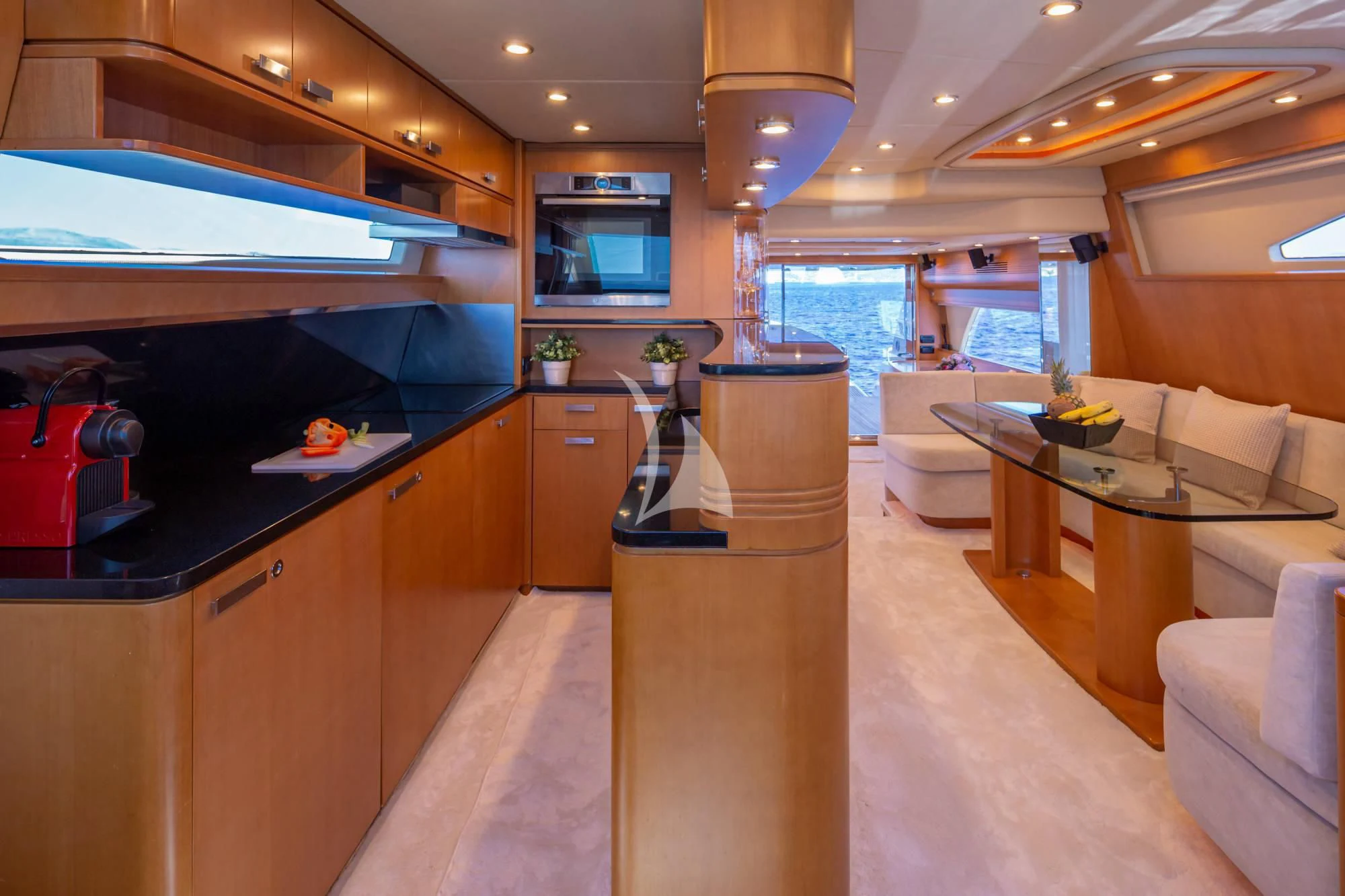 a kitchen and living room aboard LEGEND Yacht for Sale