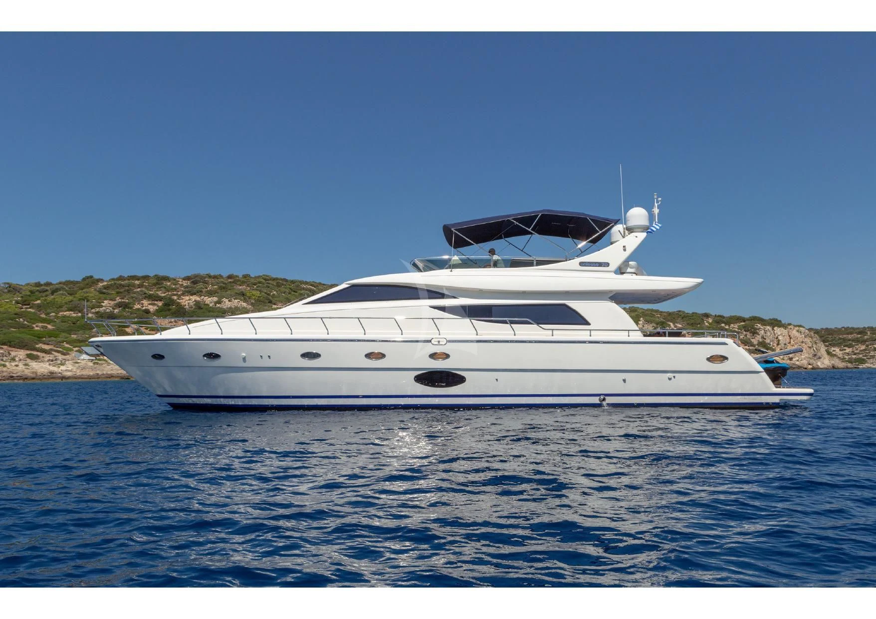 a white yacht in the water aboard LEGEND Yacht for Sale