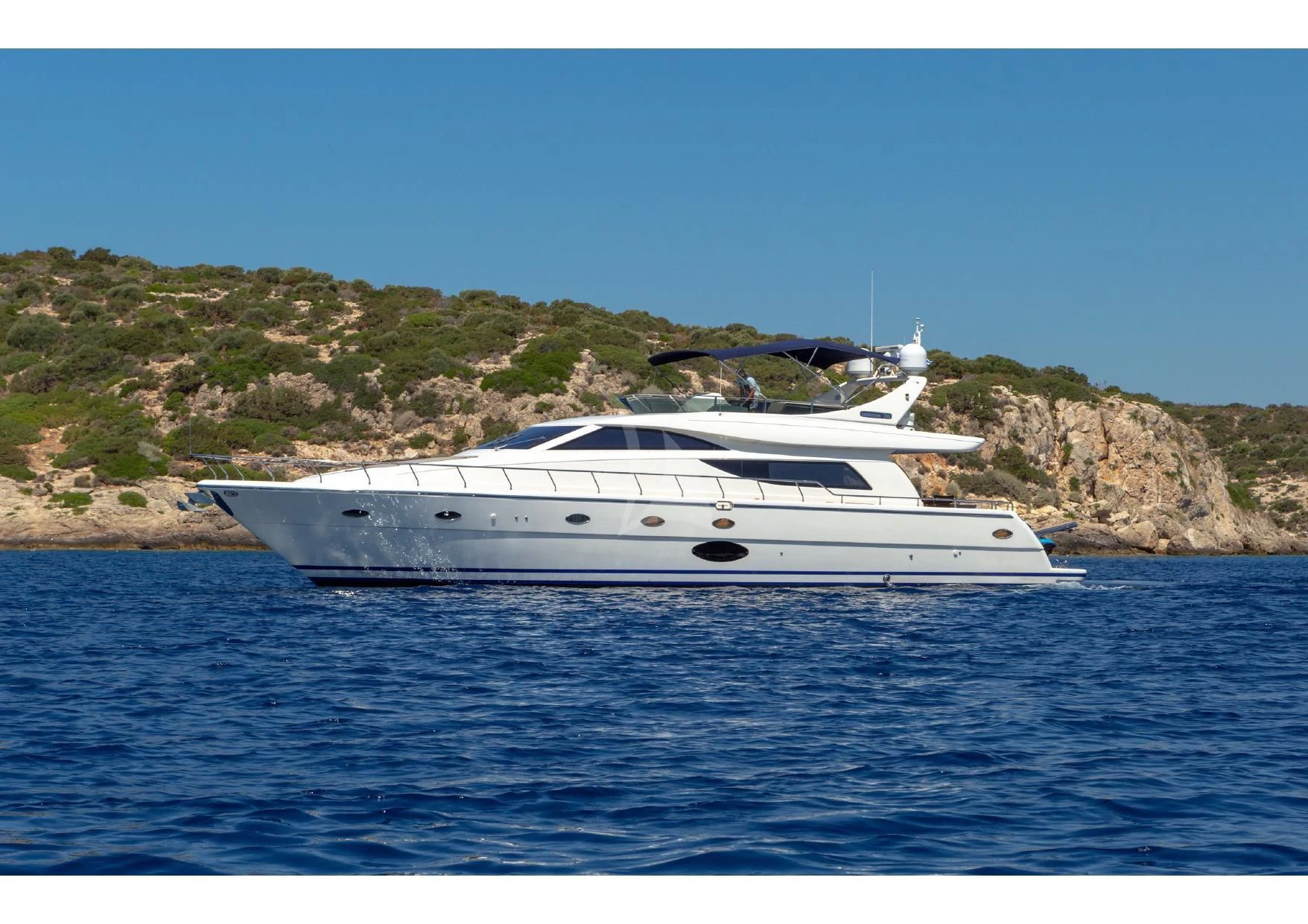 a white yacht in the water aboard LEGEND Yacht for Sale