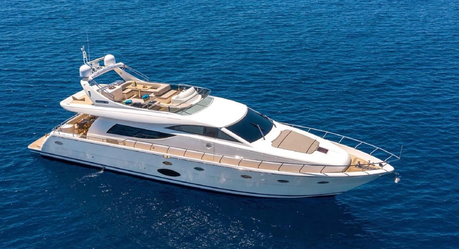 a white yacht in the water aboard LEGEND Yacht for Sale