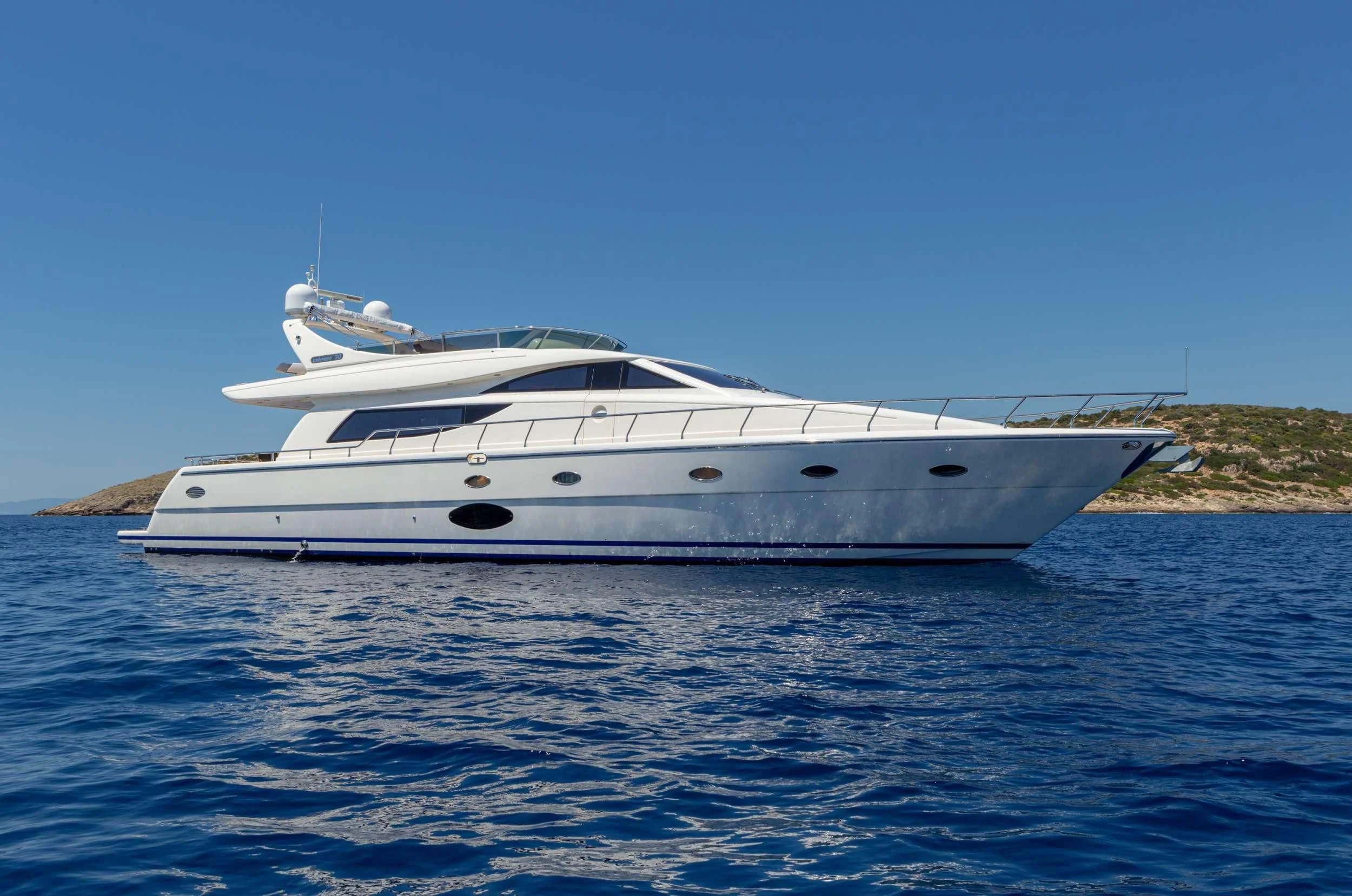 a white yacht in the water aboard LEGEND Yacht for Sale
