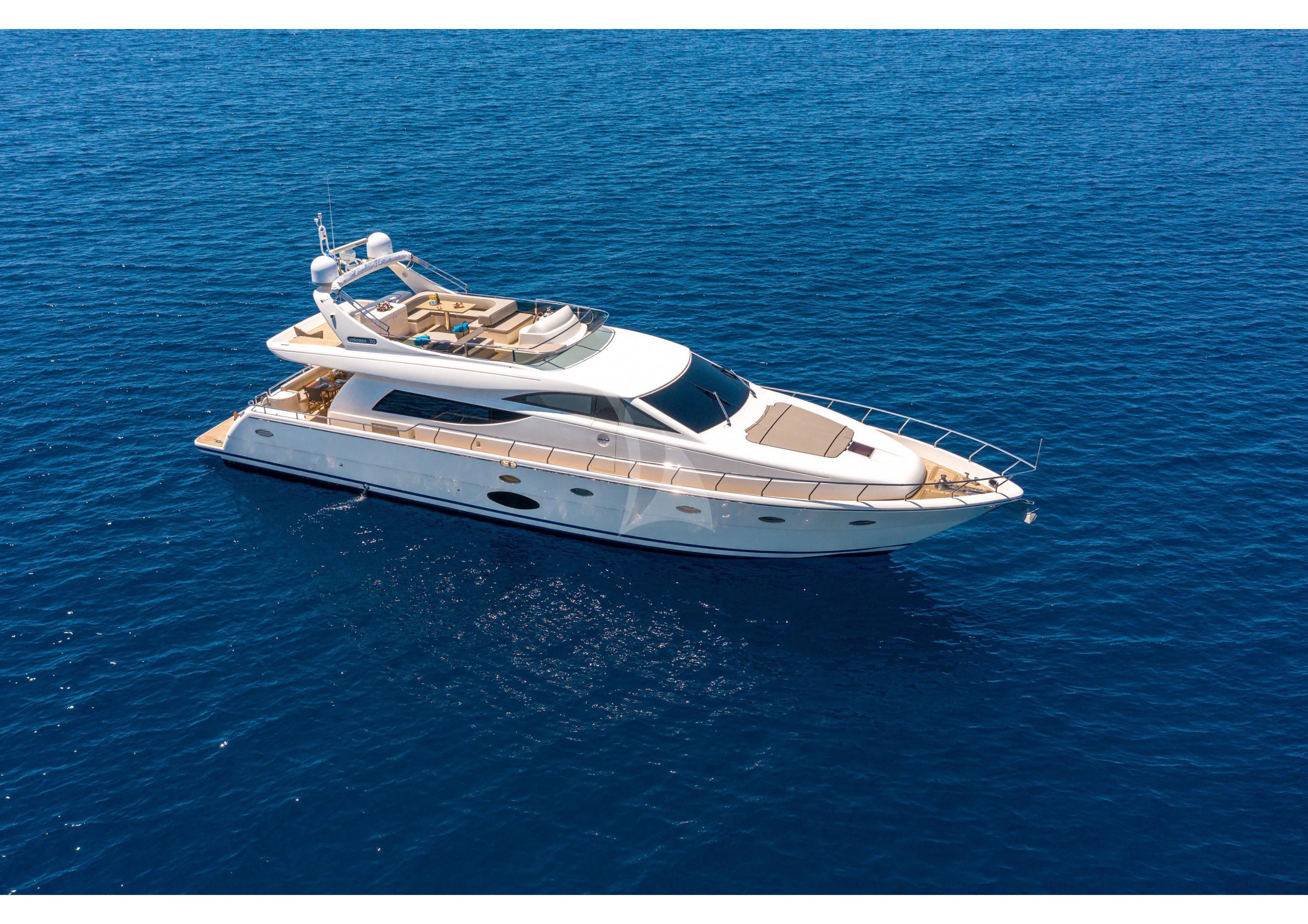 a white yacht in the water aboard LEGEND Yacht for Sale