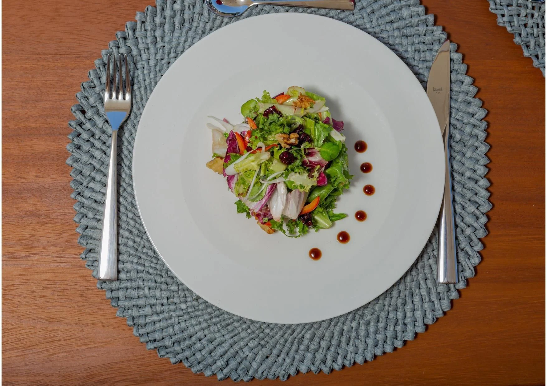 a plate of salad aboard LEGEND Yacht for Sale