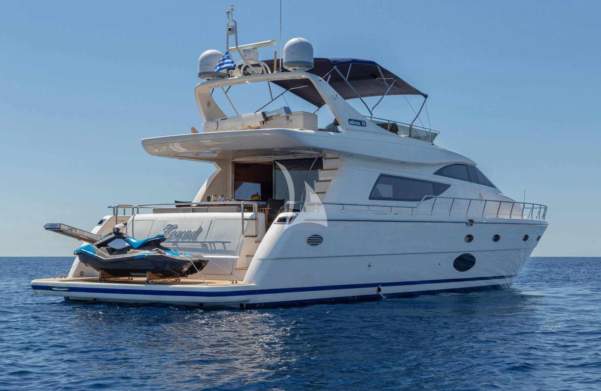 a white yacht in the water aboard LEGEND Yacht for Sale