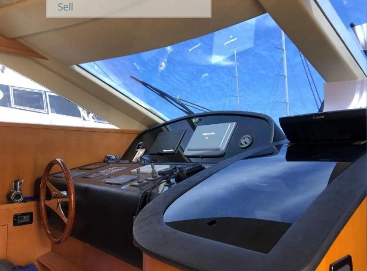 a black leather seat with a black seat and a black seat aboard LEGEND Yacht for Sale