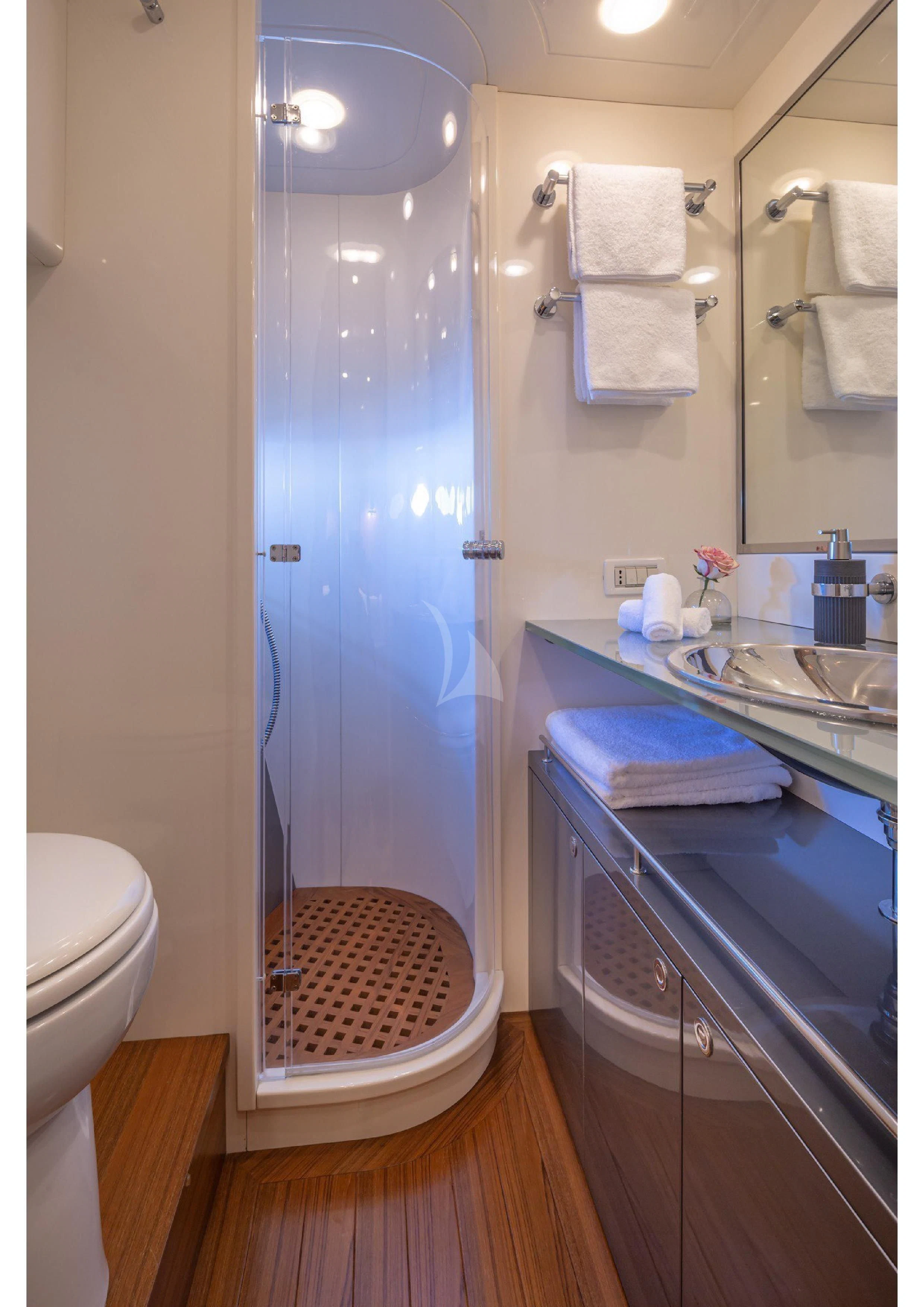 a bathroom with a sink and a shower aboard LEGEND Yacht for Sale