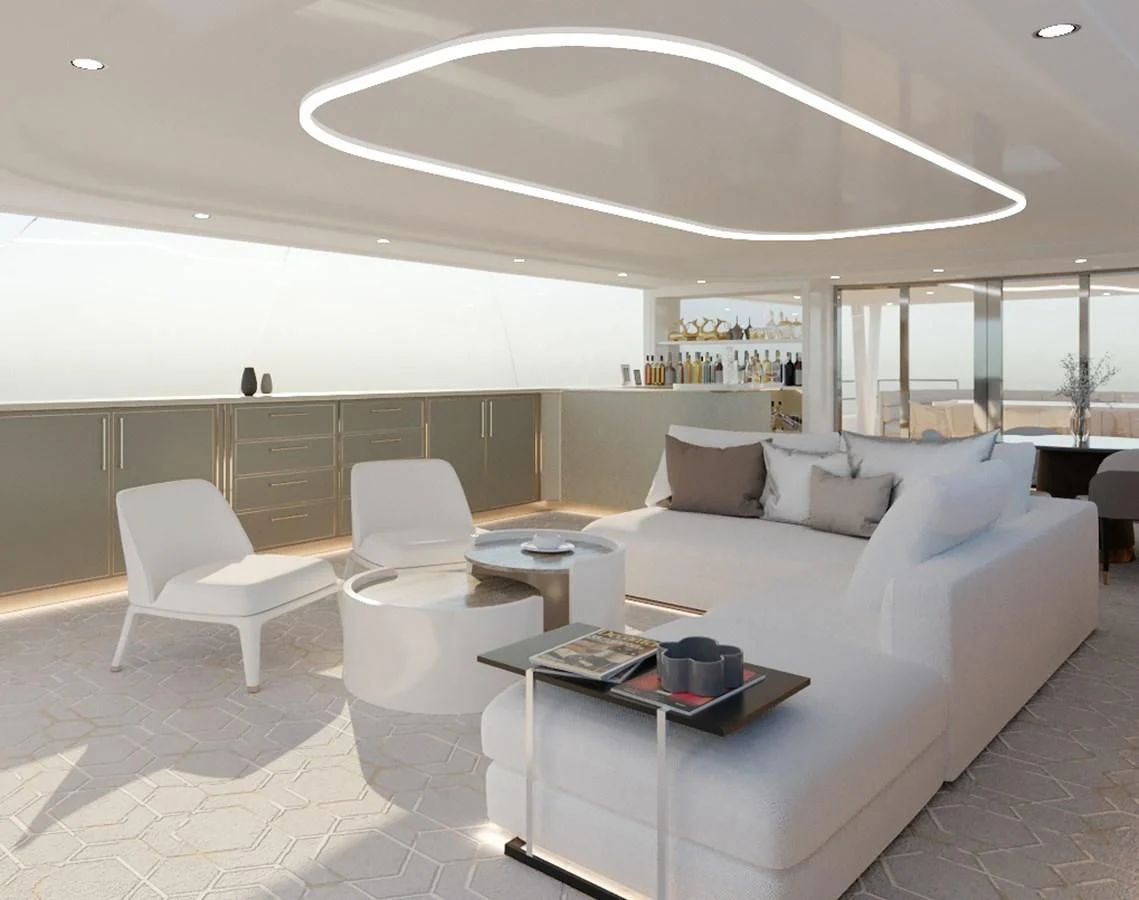 a room with a couch and a table aboard LION Yacht for Sale