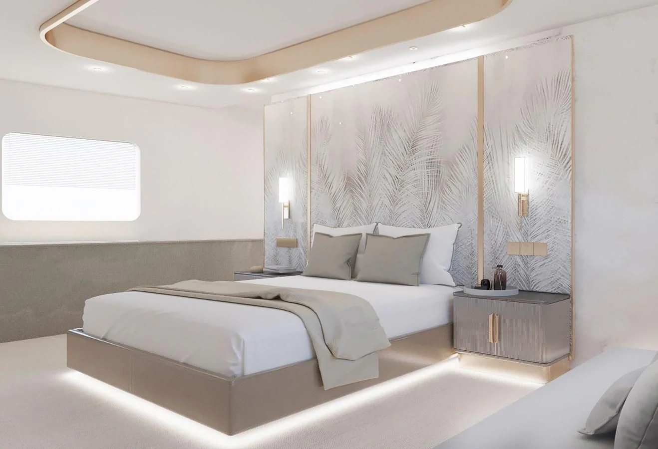 a room with a bed and a window aboard LION Yacht for Sale