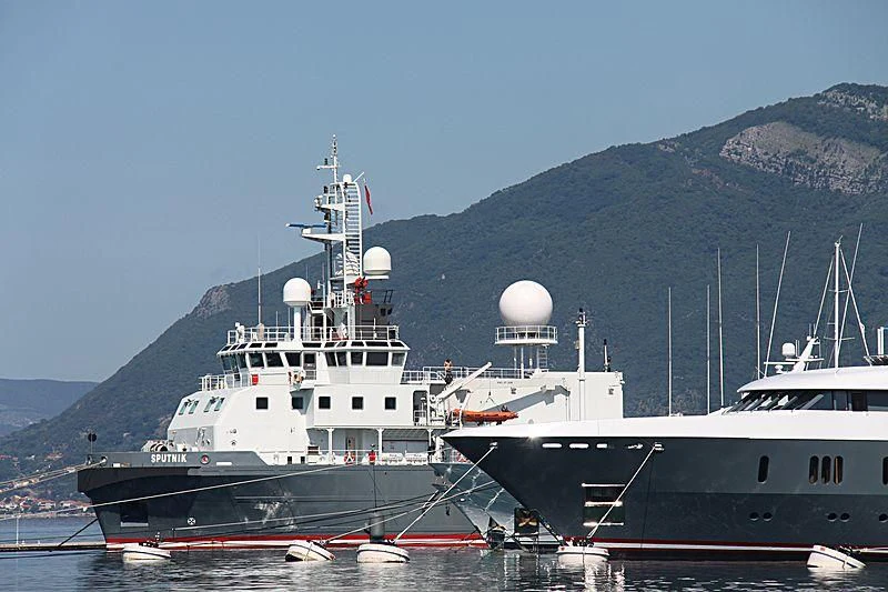 a large ship docked aboard SPUTNIK Yacht for Sale