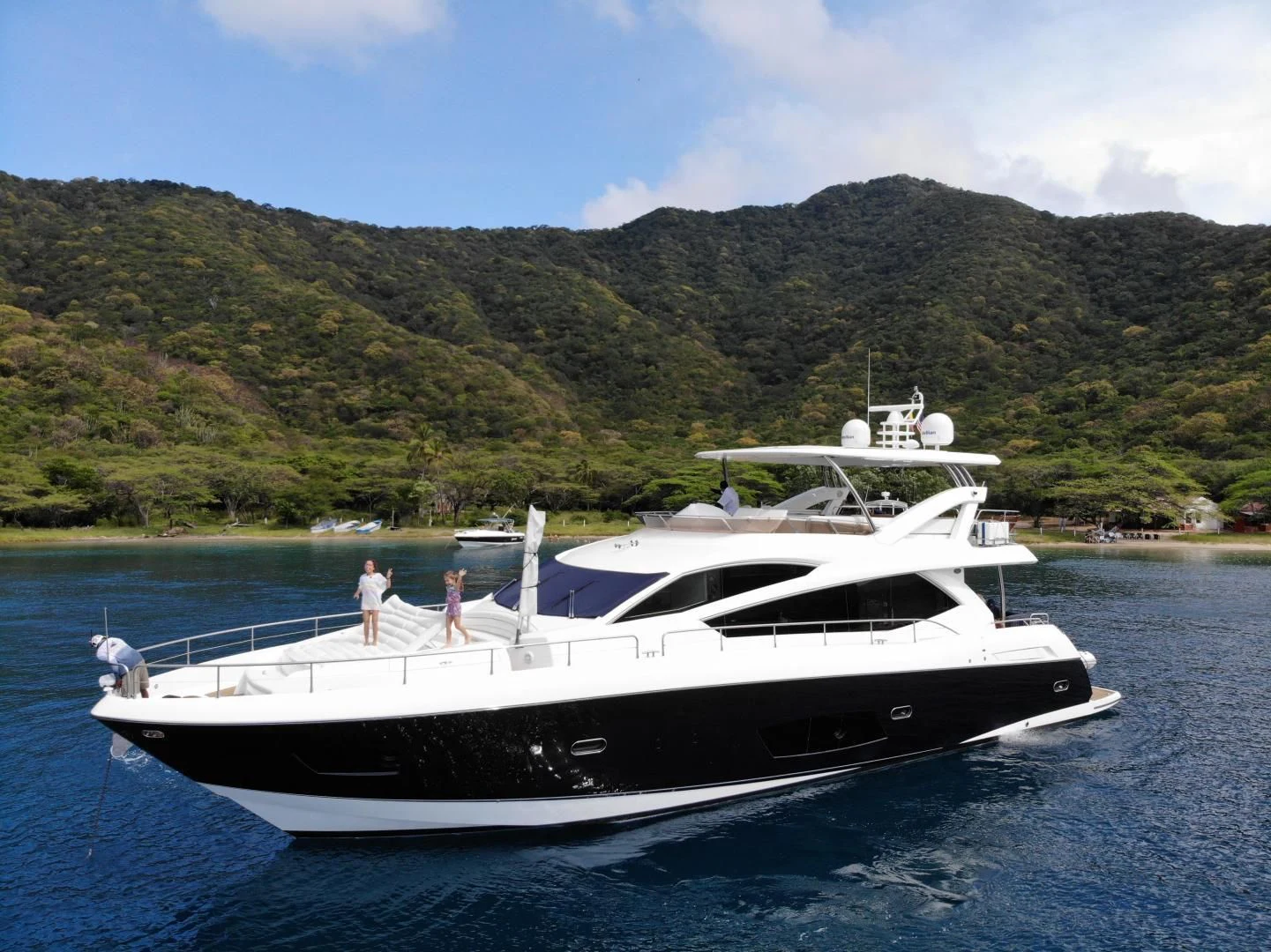 a couple people on a boat aboard SEA C Yacht for Sale