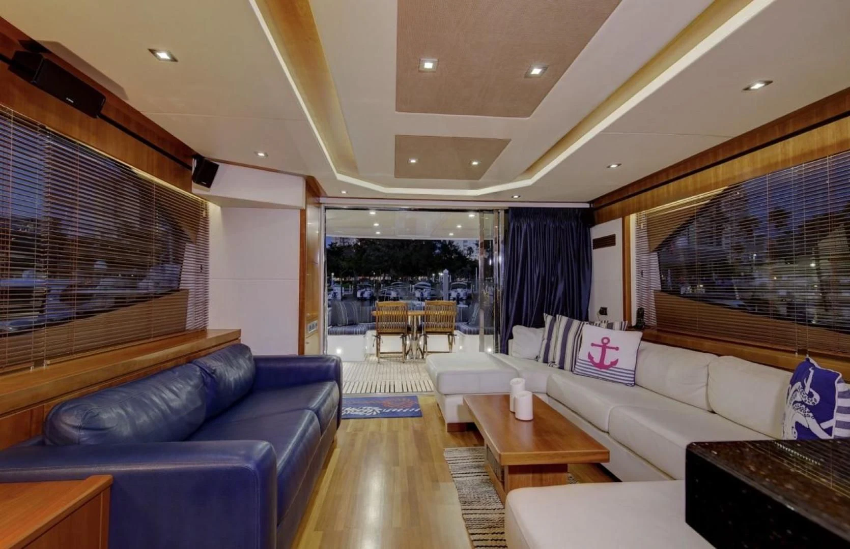 a living room with a large window aboard SEA C Yacht for Sale