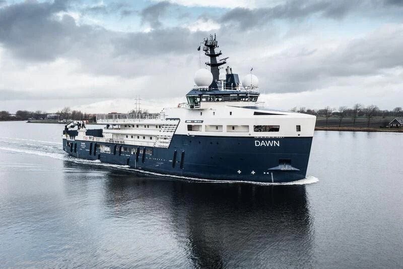 a large ship in the water aboard DAWN Yacht for Sale