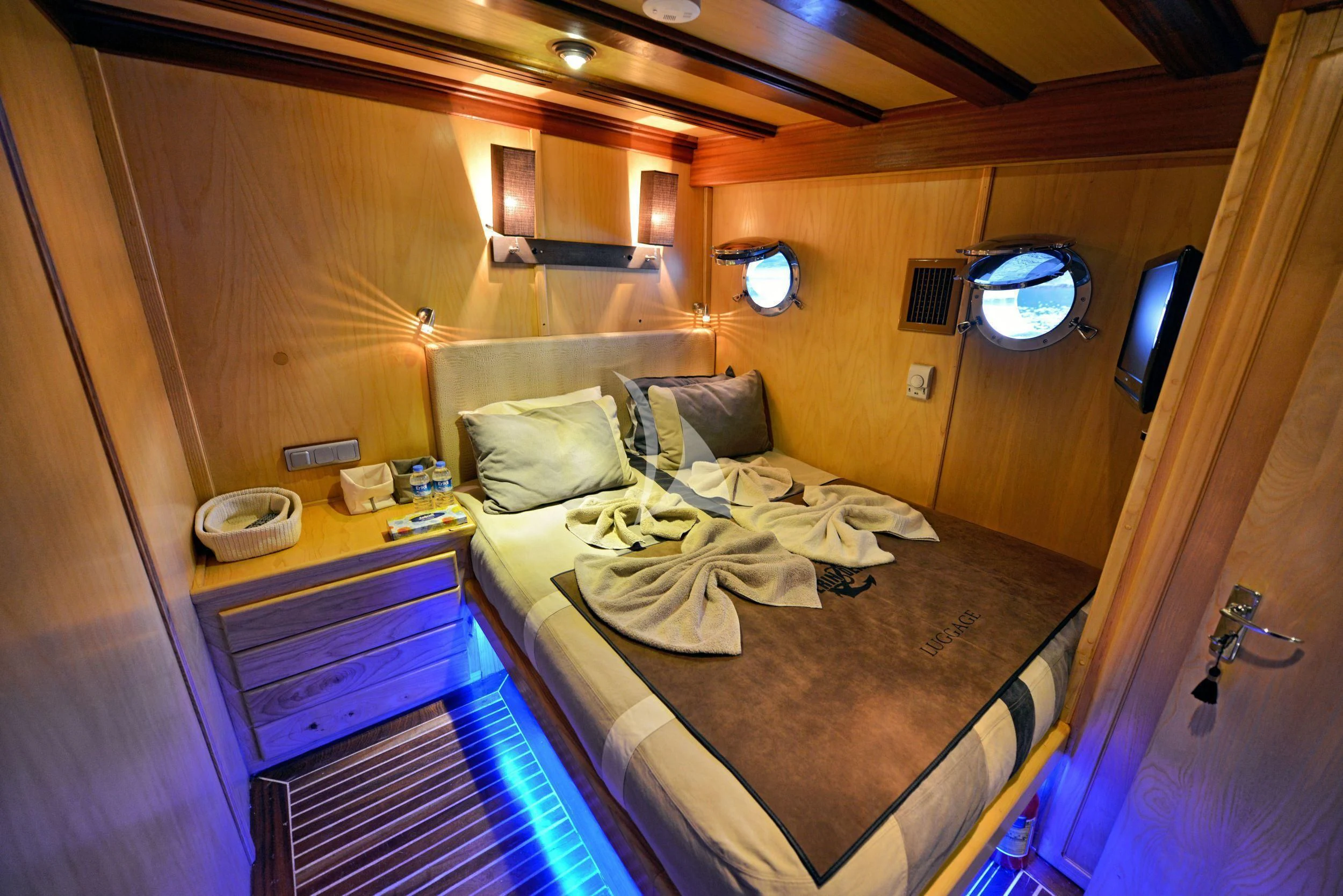 a bed in a room aboard DERIN DENIZ Yacht for Sale