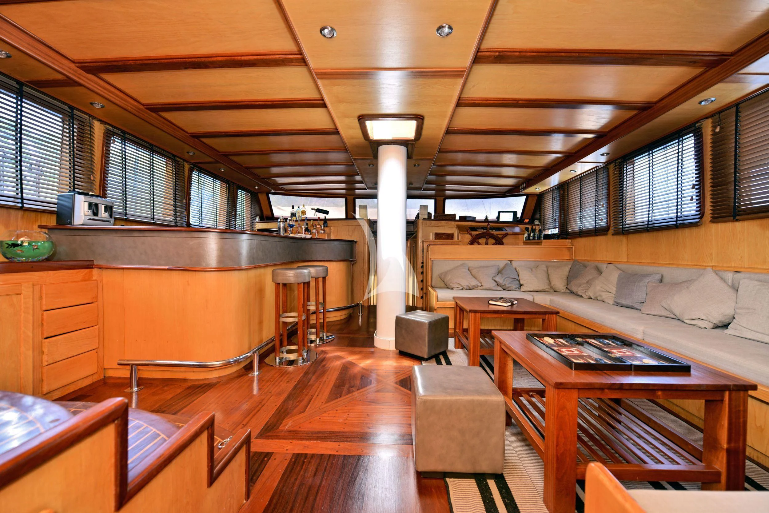 a room with a couch and a table aboard DERIN DENIZ Yacht for Sale