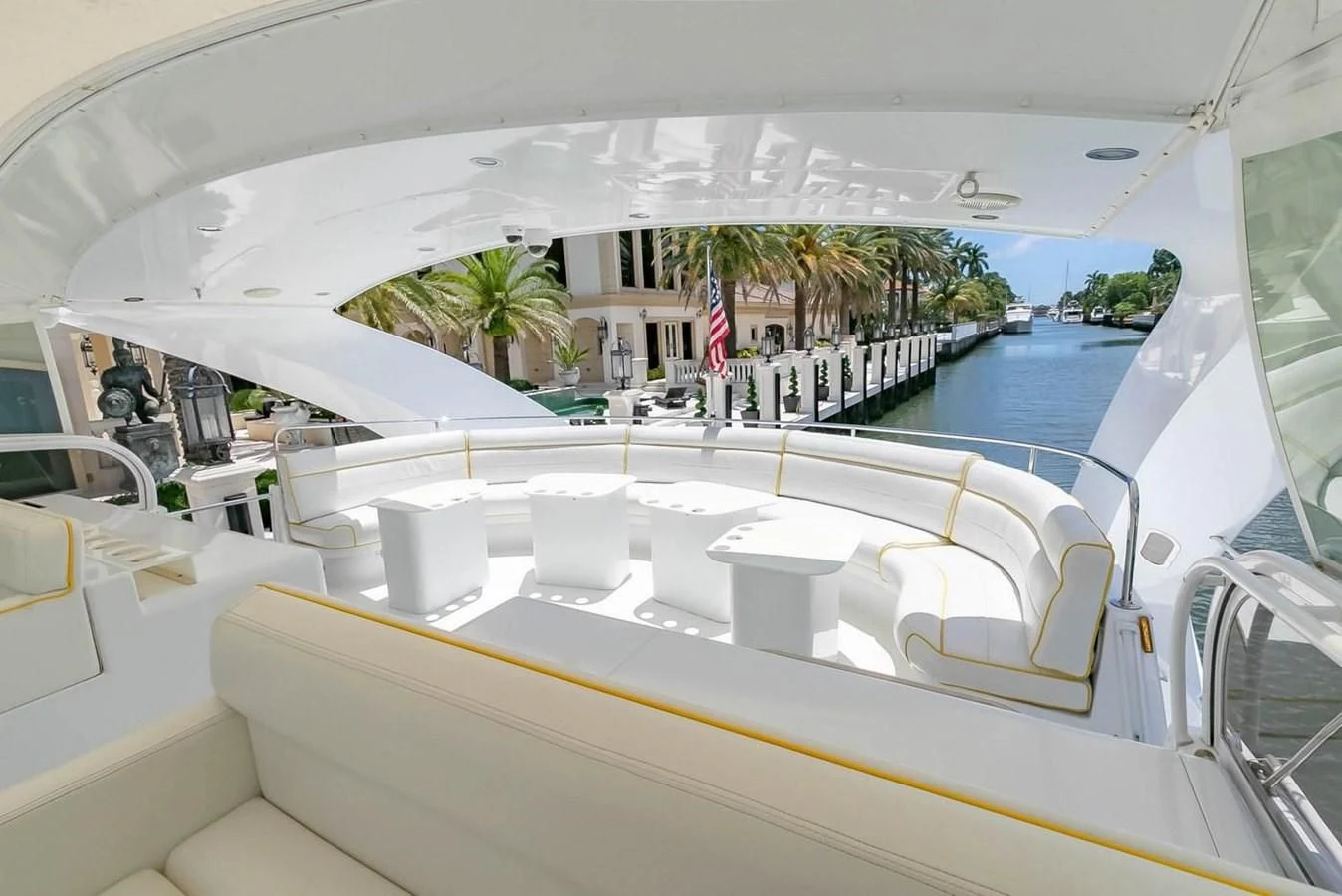 a pool with chairs and tables aboard PURELY PLEASURE Yacht for Sale