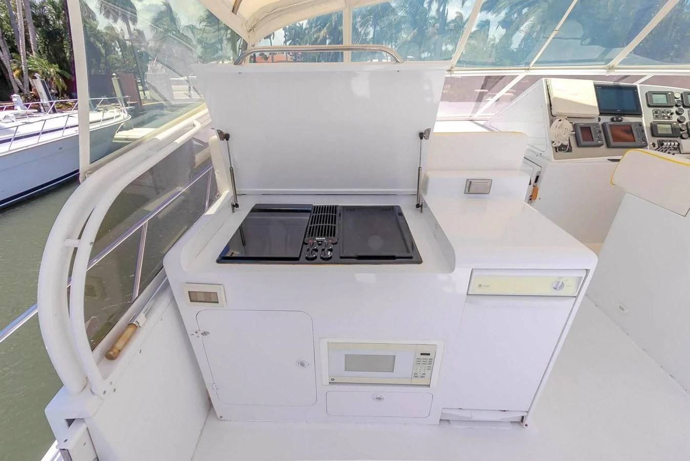 a white machine with a black screen aboard PURELY PLEASURE Yacht for Sale
