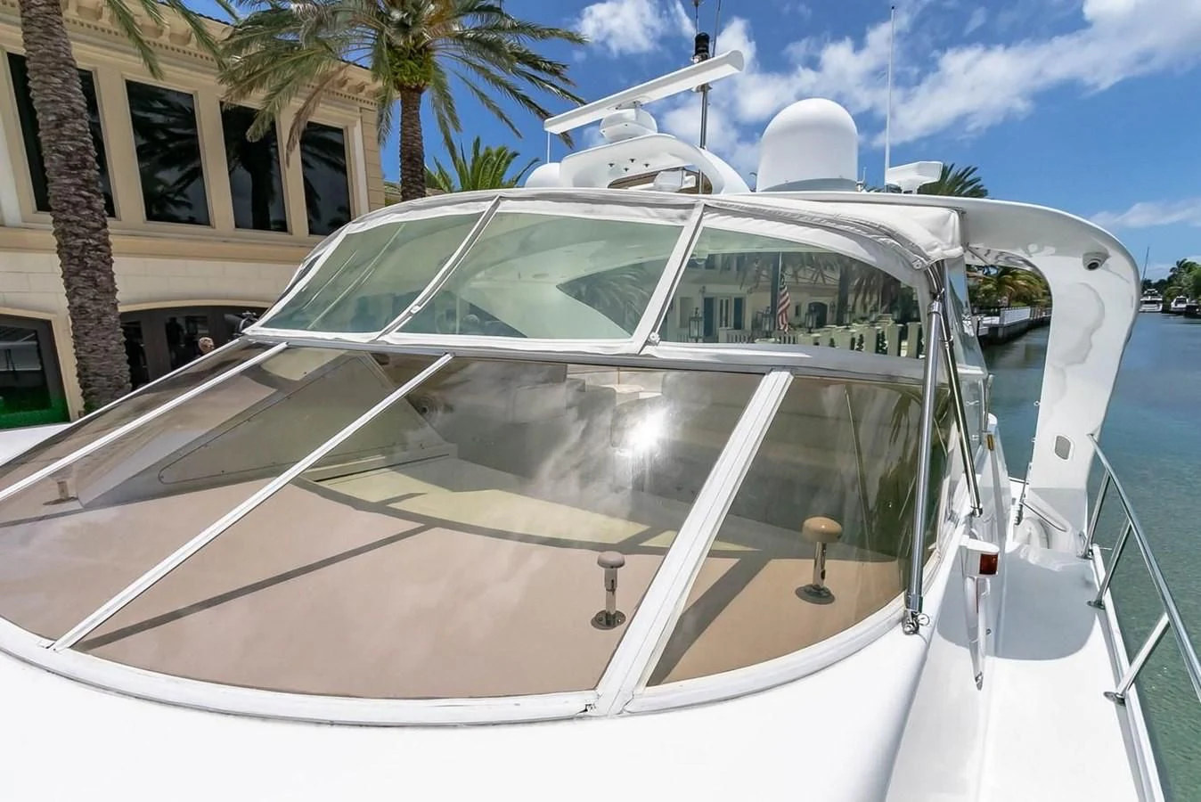 a white car with a large windshield aboard PURELY PLEASURE Yacht for Sale