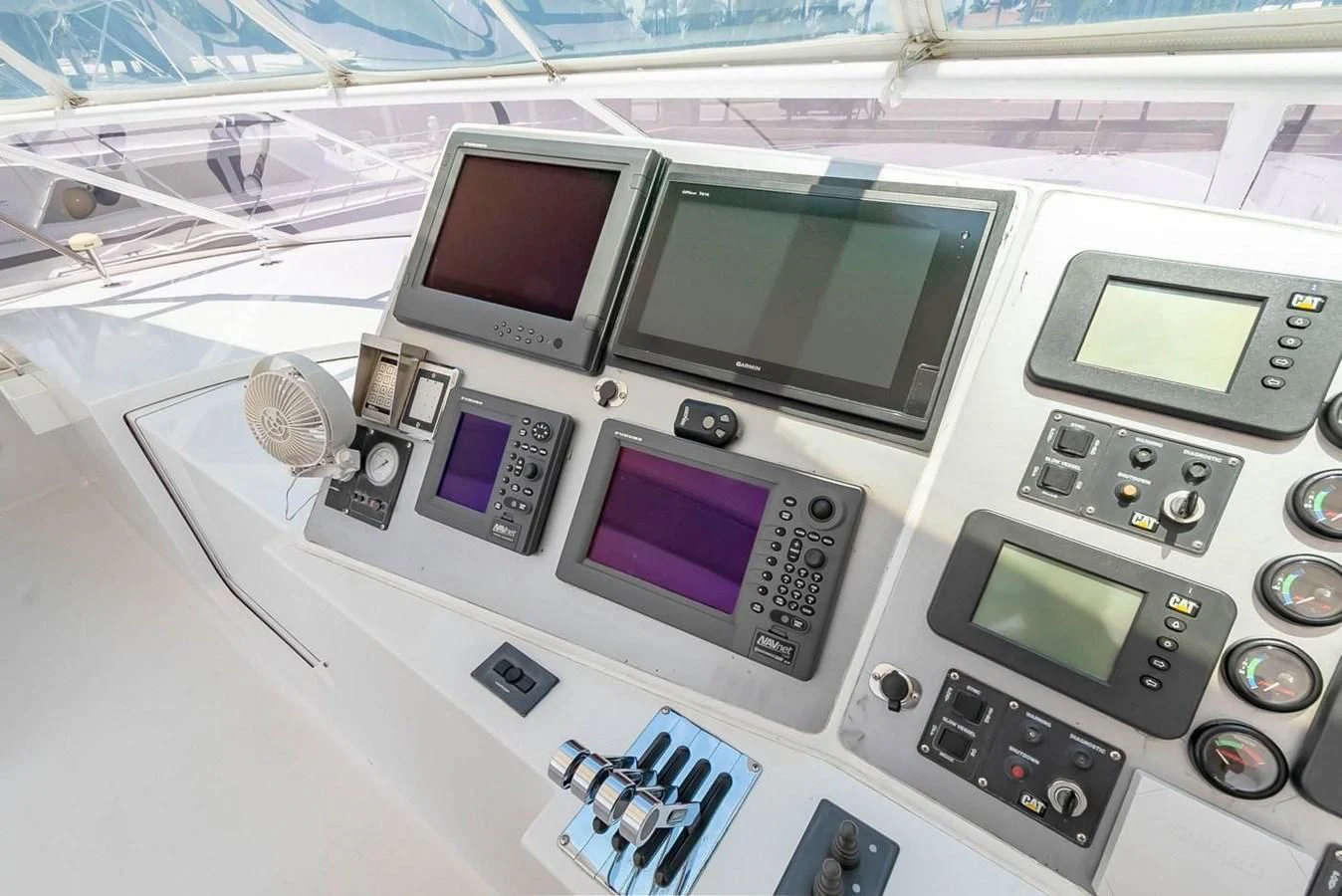 a group of electronic devices aboard PURELY PLEASURE Yacht for Sale