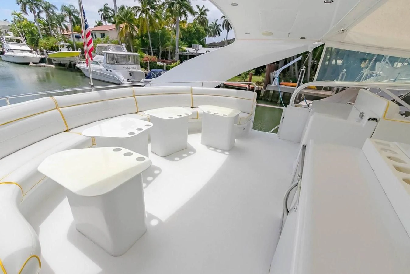 a row of white toilets on a boat aboard PURELY PLEASURE Yacht for Sale