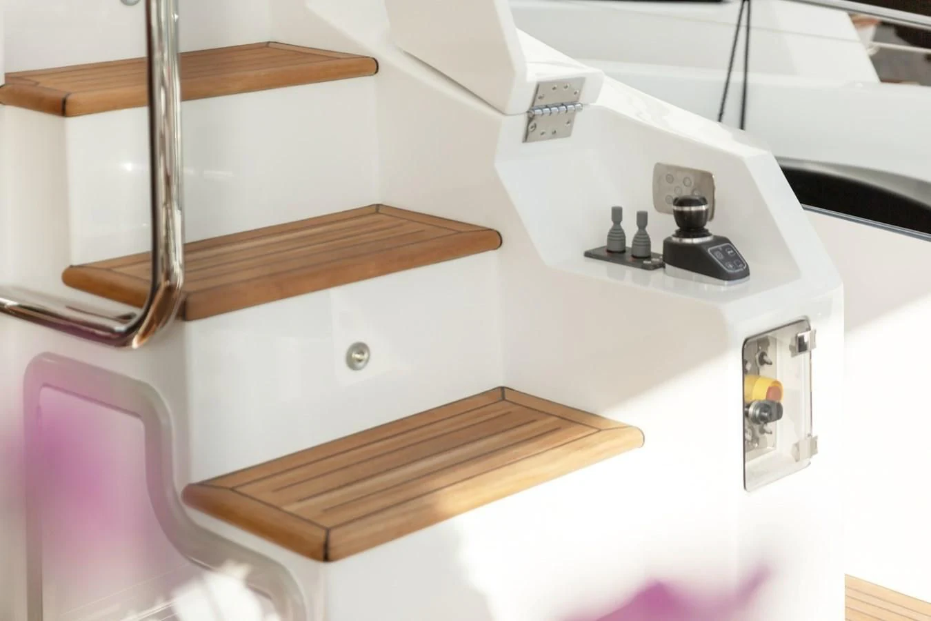 a white machine with a wooden handle aboard SOLSTICE Yacht for Sale