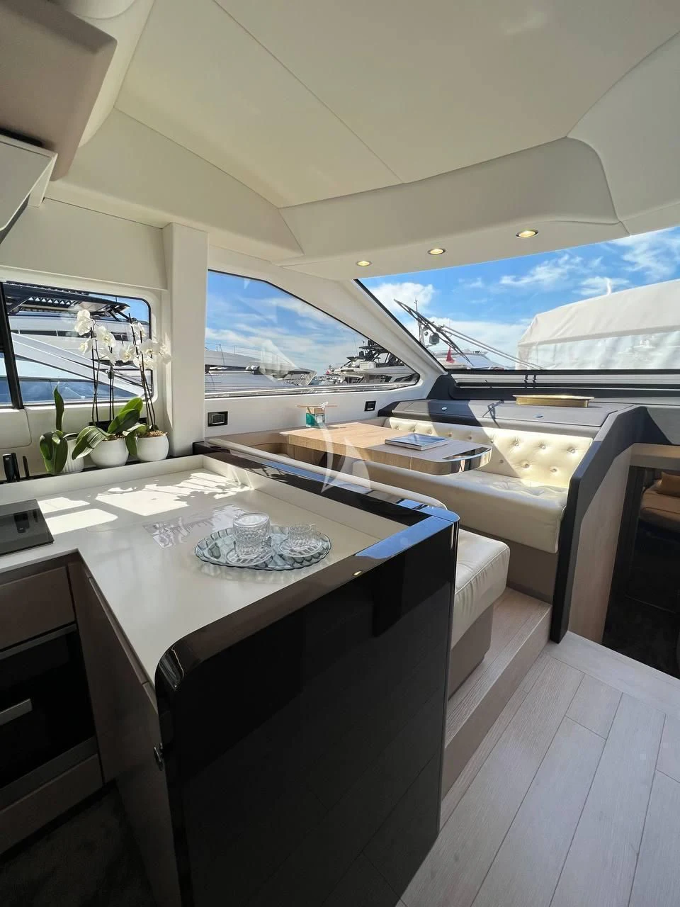 a kitchen with a large window aboard SOLSTICE Yacht for Sale