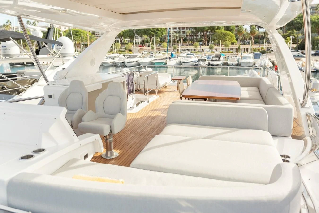 a large white boat with a deck aboard SOLSTICE Yacht for Sale