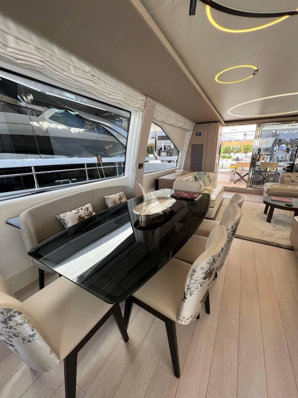 a living room with a large tv aboard SOLSTICE Yacht for Sale