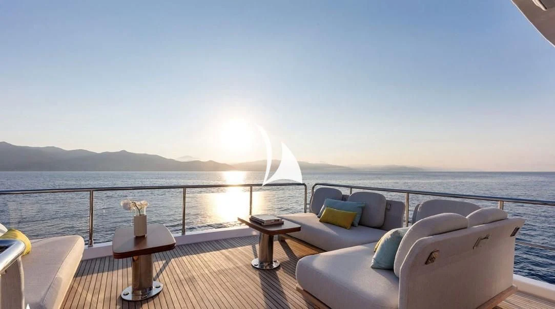 a large white boat on a body of water aboard SOLSTICE Yacht for Sale
