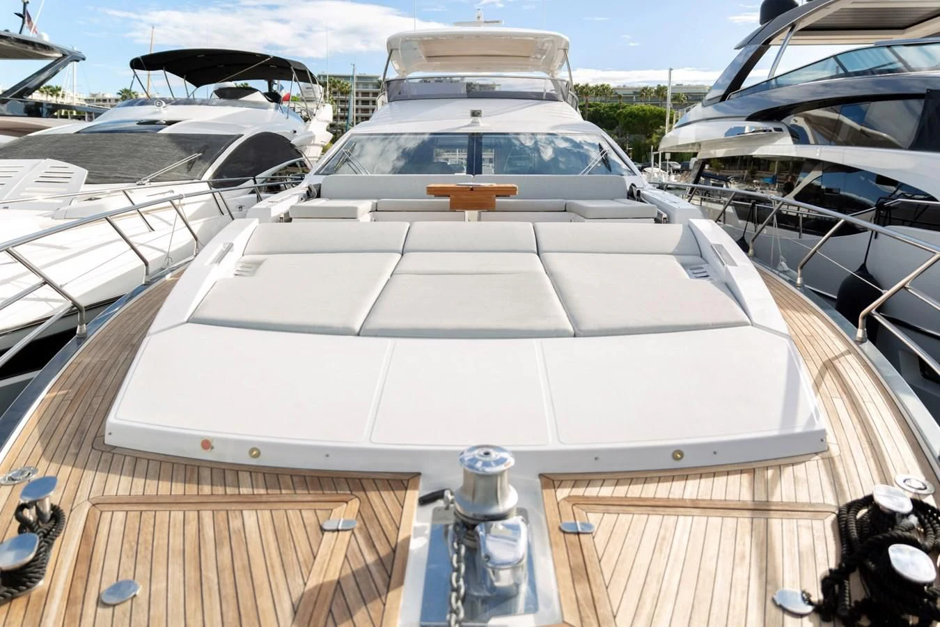 a white boat on a deck aboard SOLSTICE Yacht for Sale