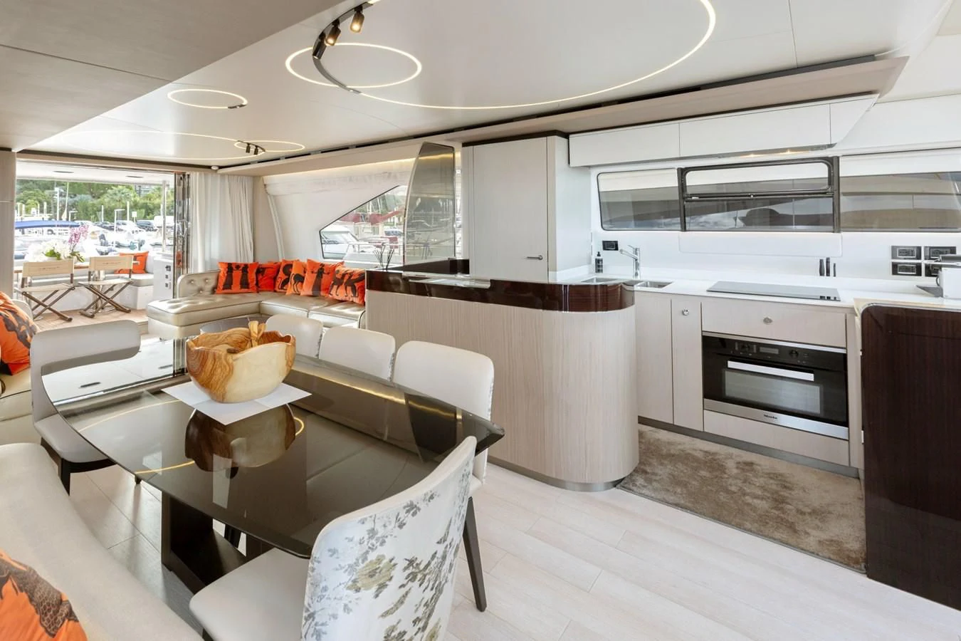 a kitchen with a dining table aboard SOLSTICE Yacht for Sale