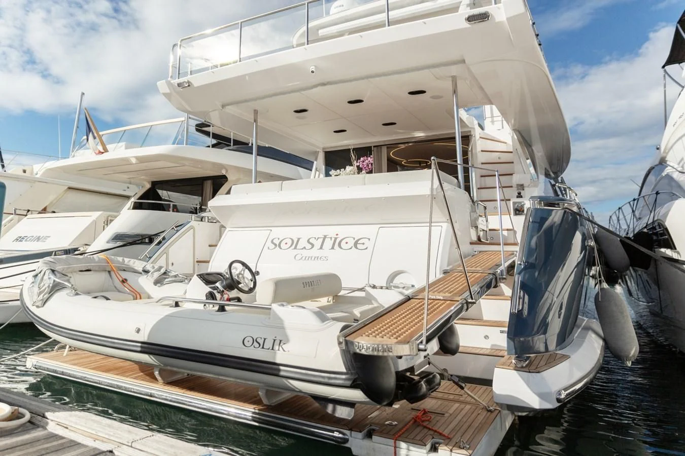 a boat docked at a pier aboard SOLSTICE Yacht for Sale