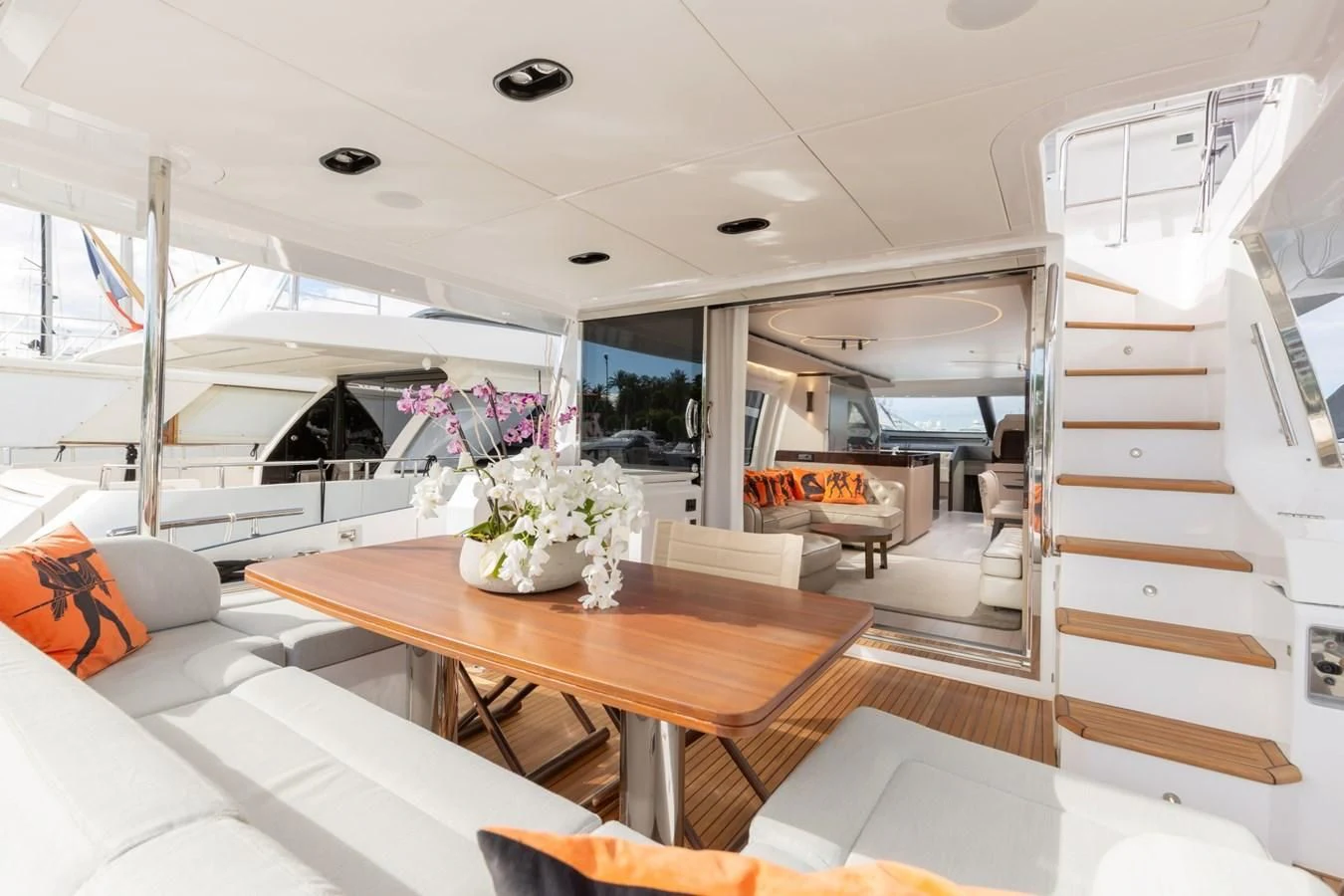 a room with a table and chairs aboard SOLSTICE Yacht for Sale