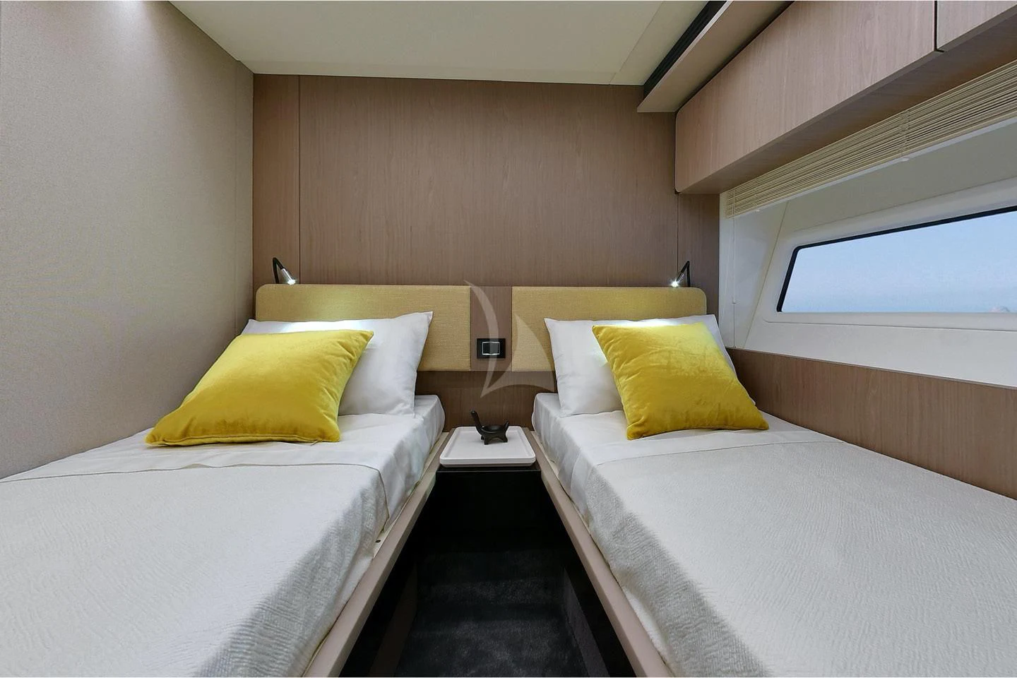 a couple of beds in a room aboard SOLSTICE Yacht for Sale