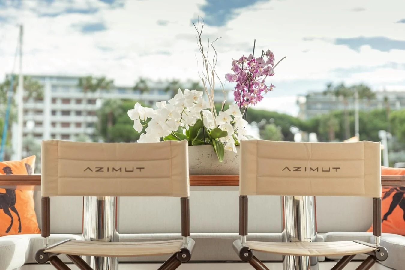 a table with a flower on it aboard SOLSTICE Yacht for Sale
