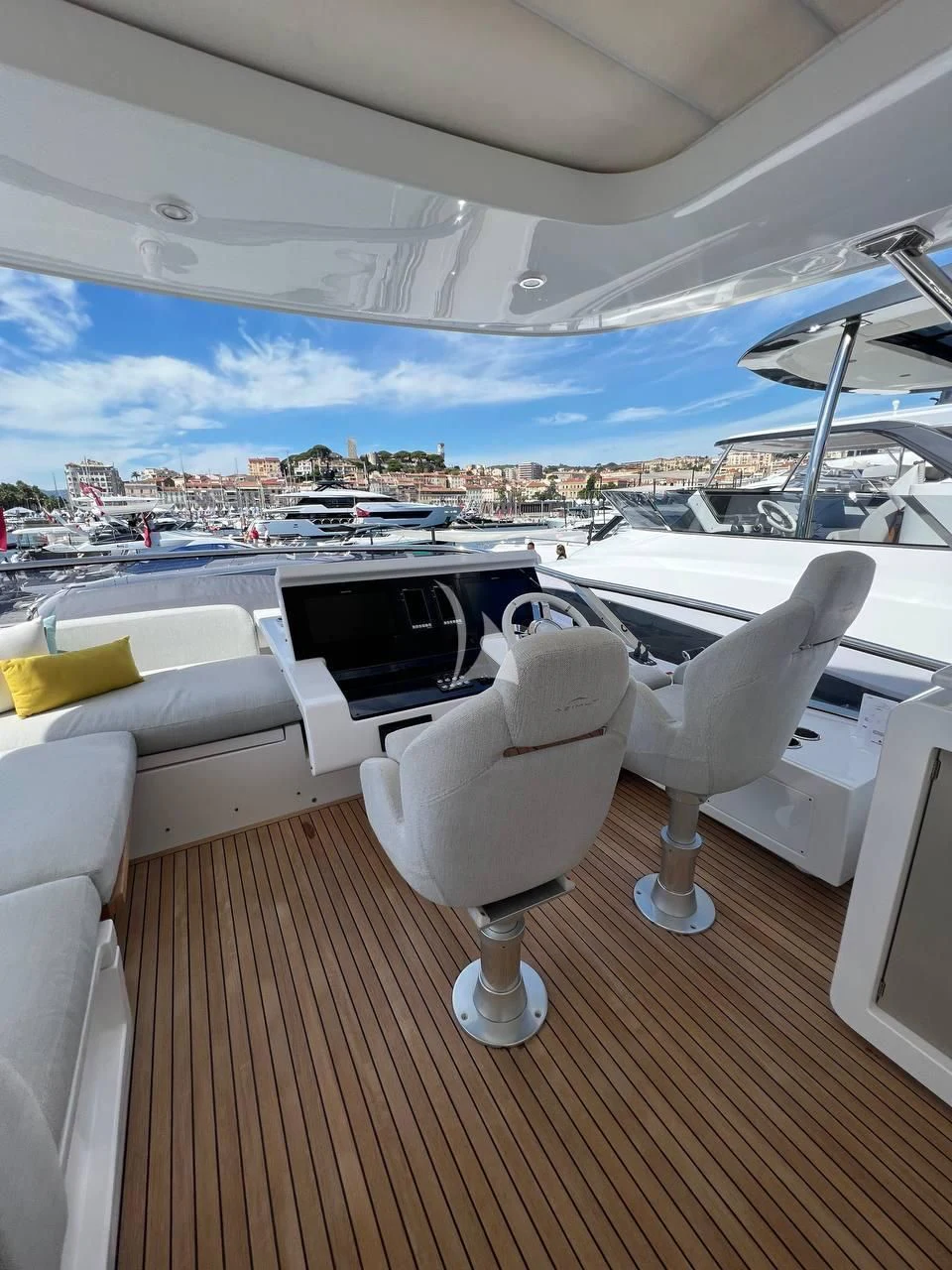 a room with a view of the city and water aboard SOLSTICE Yacht for Sale