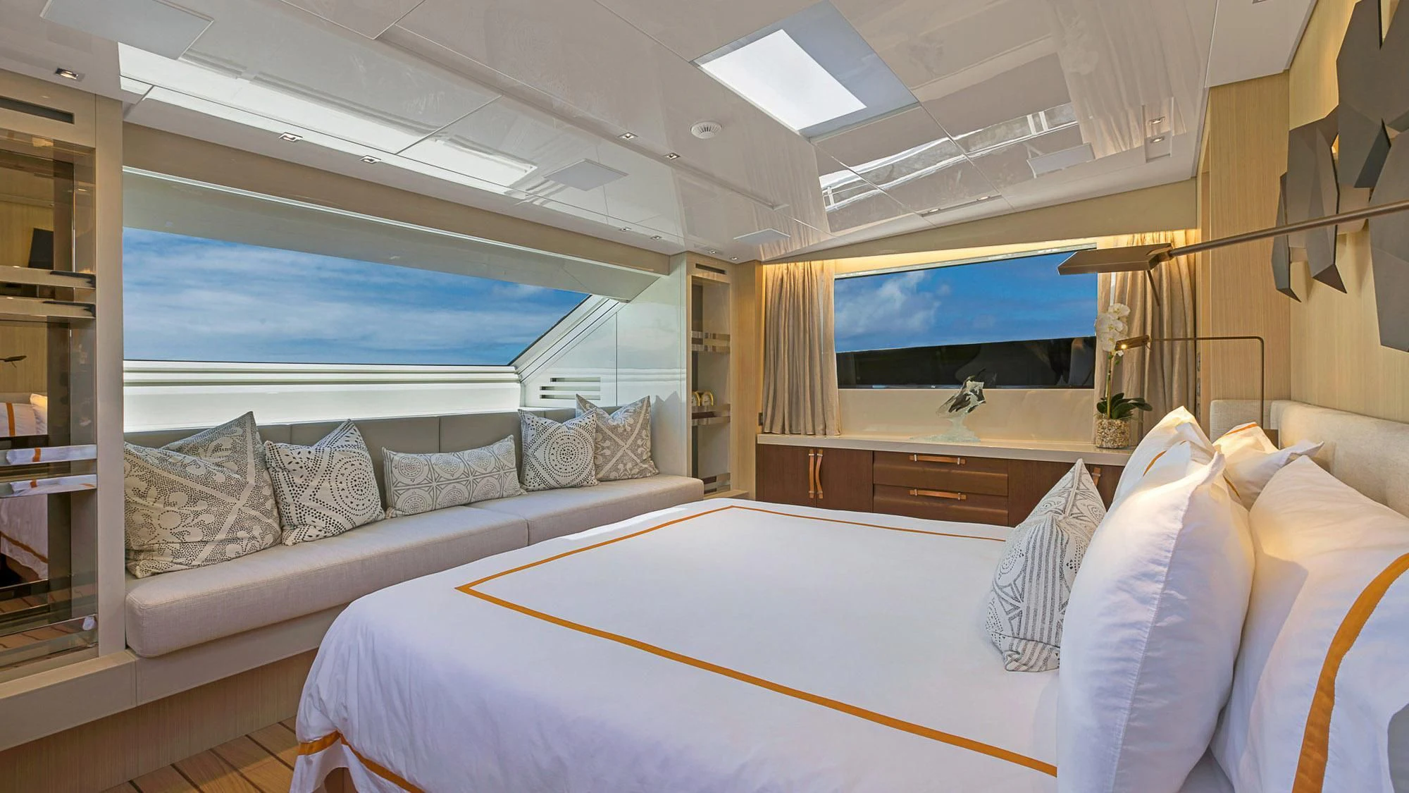 a room with a bed and a large window aboard CLEAR EYES Yacht for Sale