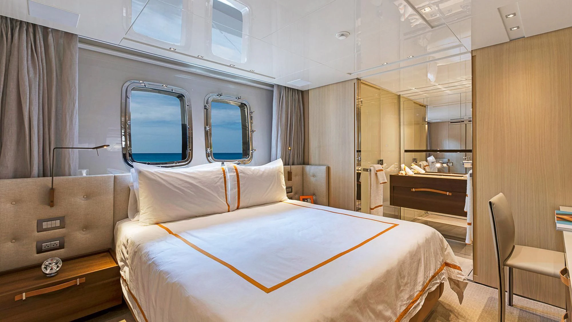 a room with a bed and a desk aboard CLEAR EYES Yacht for Sale