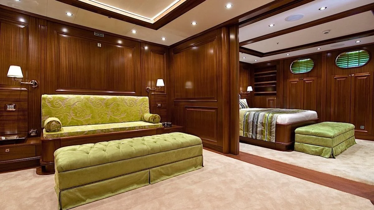 a room with a bed and a couch aboard CLEAR EYES Yacht for Sale