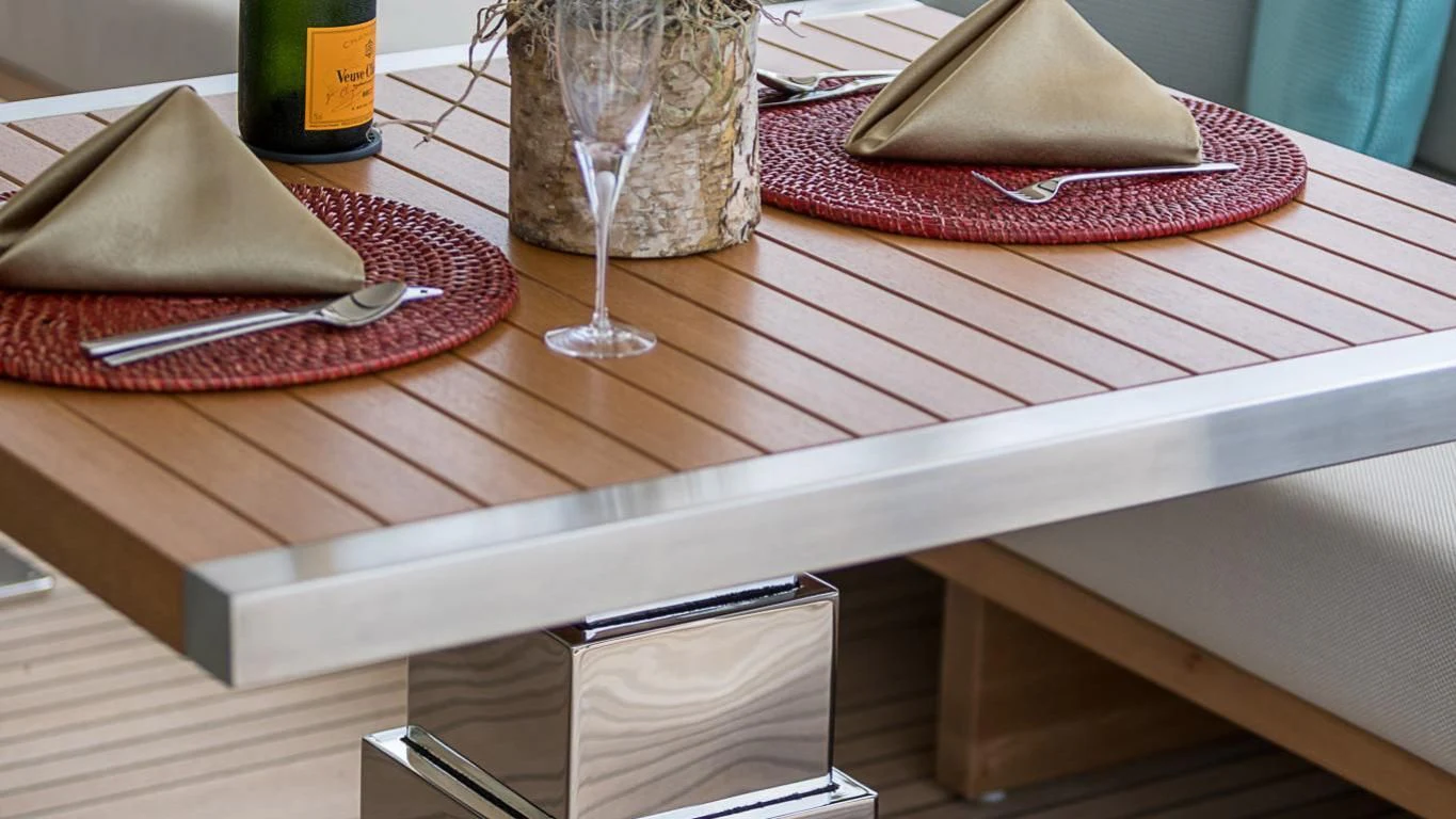a table with a glass and a napkin on it aboard CLEAR EYES Yacht for Sale