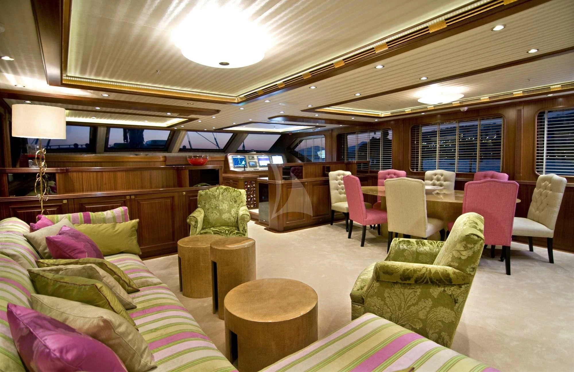 a room with a couch and chairs aboard CLEAR EYES Yacht for Sale