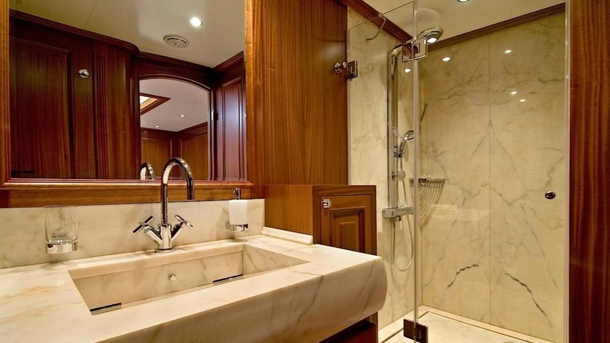 a bathroom with a glass shower aboard CLEAR EYES Yacht for Sale