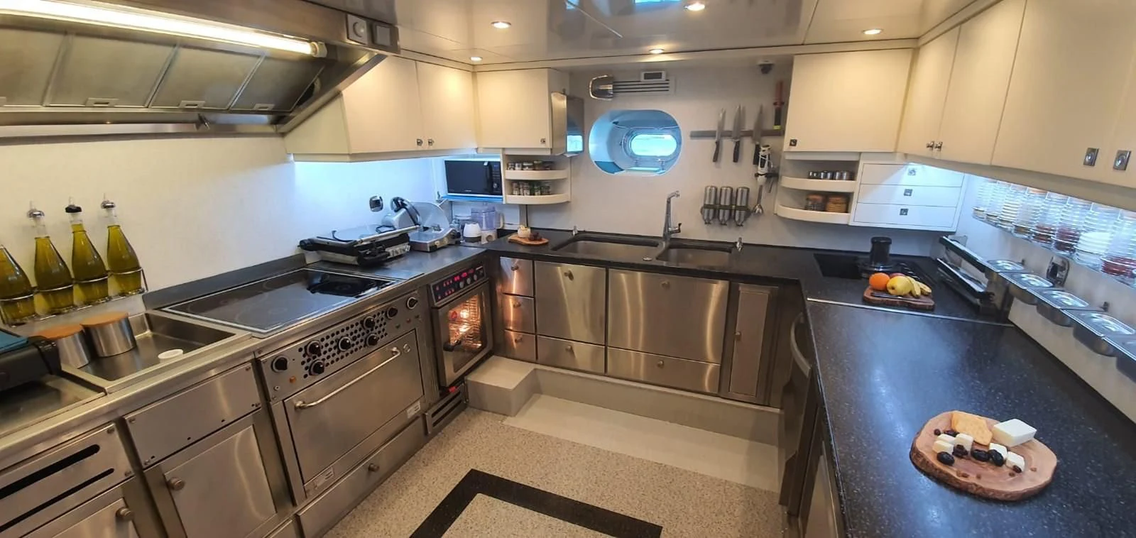 a kitchen with stainless steel appliances aboard CLEAR EYES Yacht for Sale