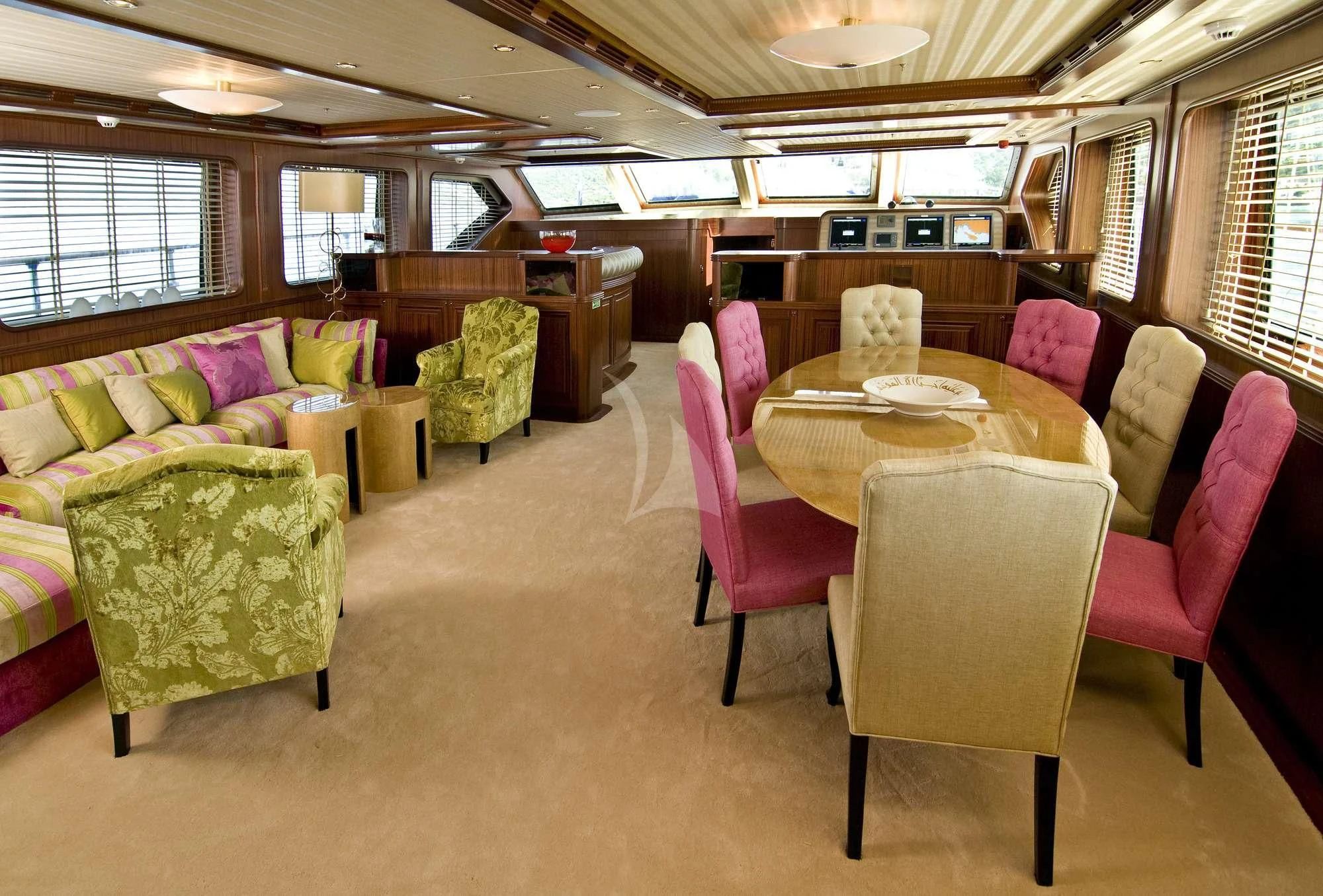a room with a table and chairs aboard CLEAR EYES Yacht for Sale