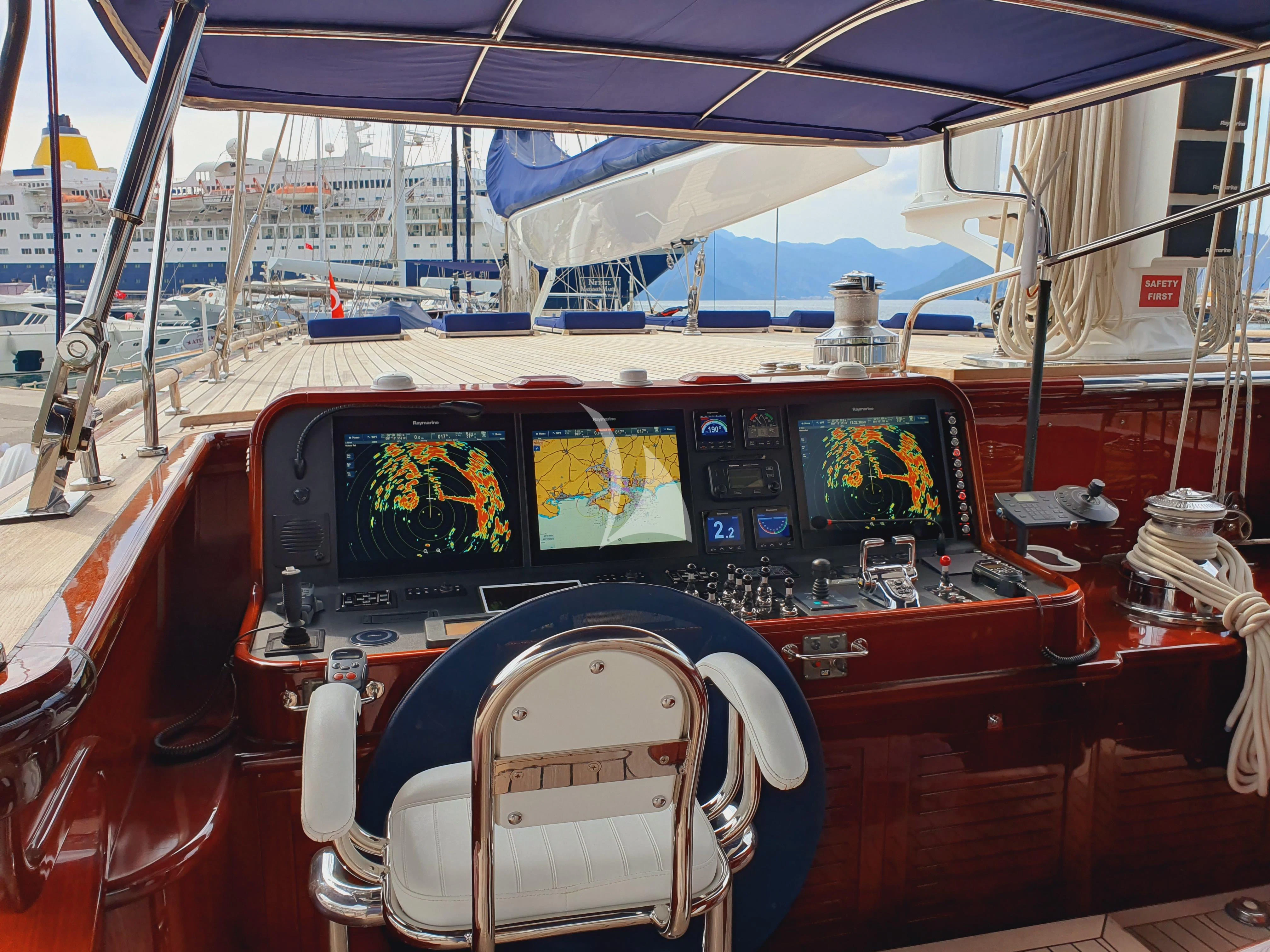 the cockpit of a red vehicle aboard CLEAR EYES Yacht for Sale