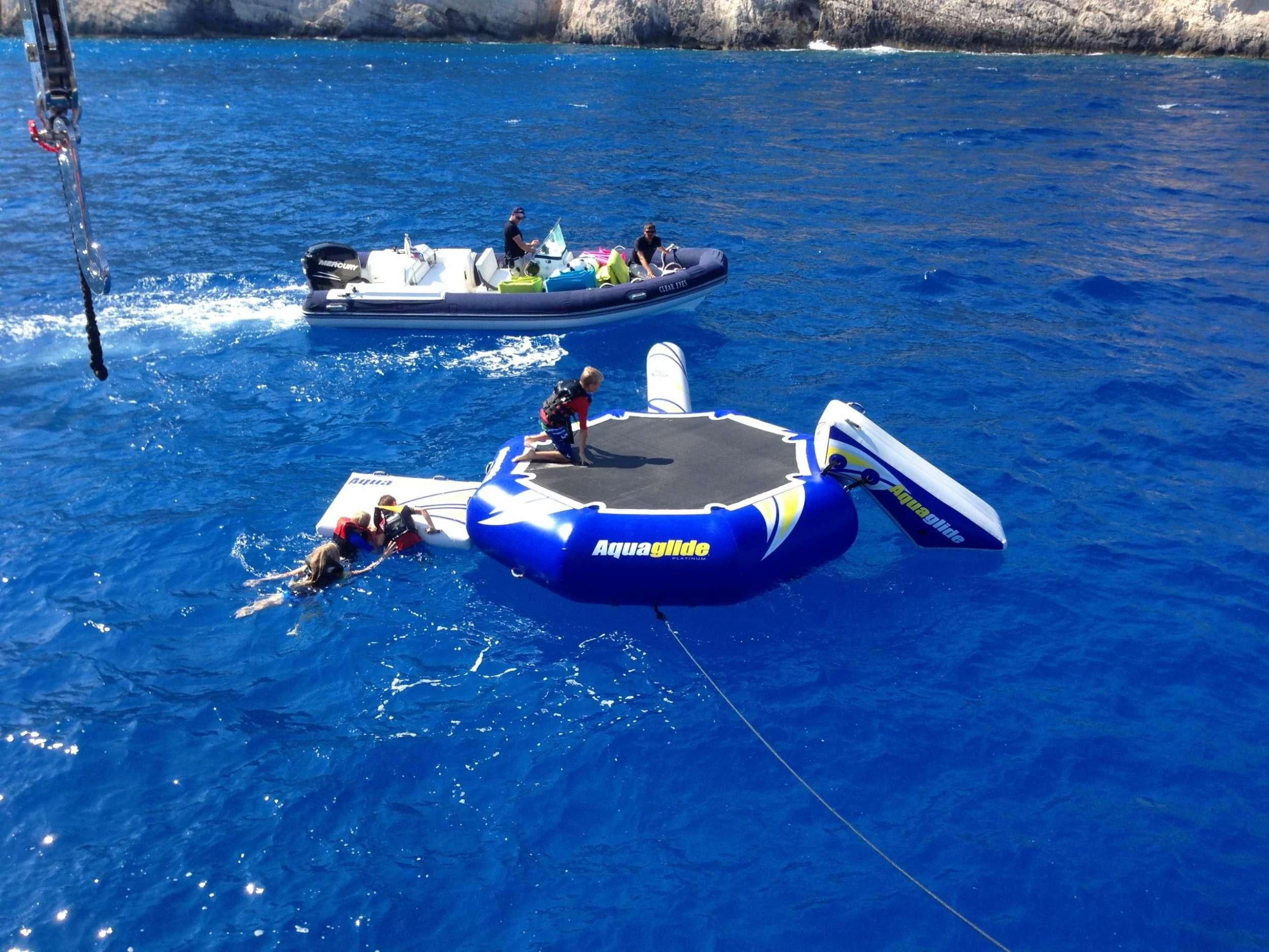 a group of people on a raft aboard CLEAR EYES Yacht for Sale
